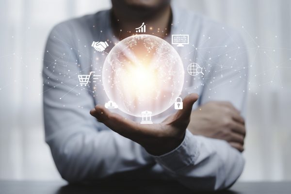 Man hand holding virtual world  with internet connection for metaverse. Global business marketing and banking financial pass thru application technology concept.